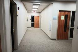 hallway with classroom doors